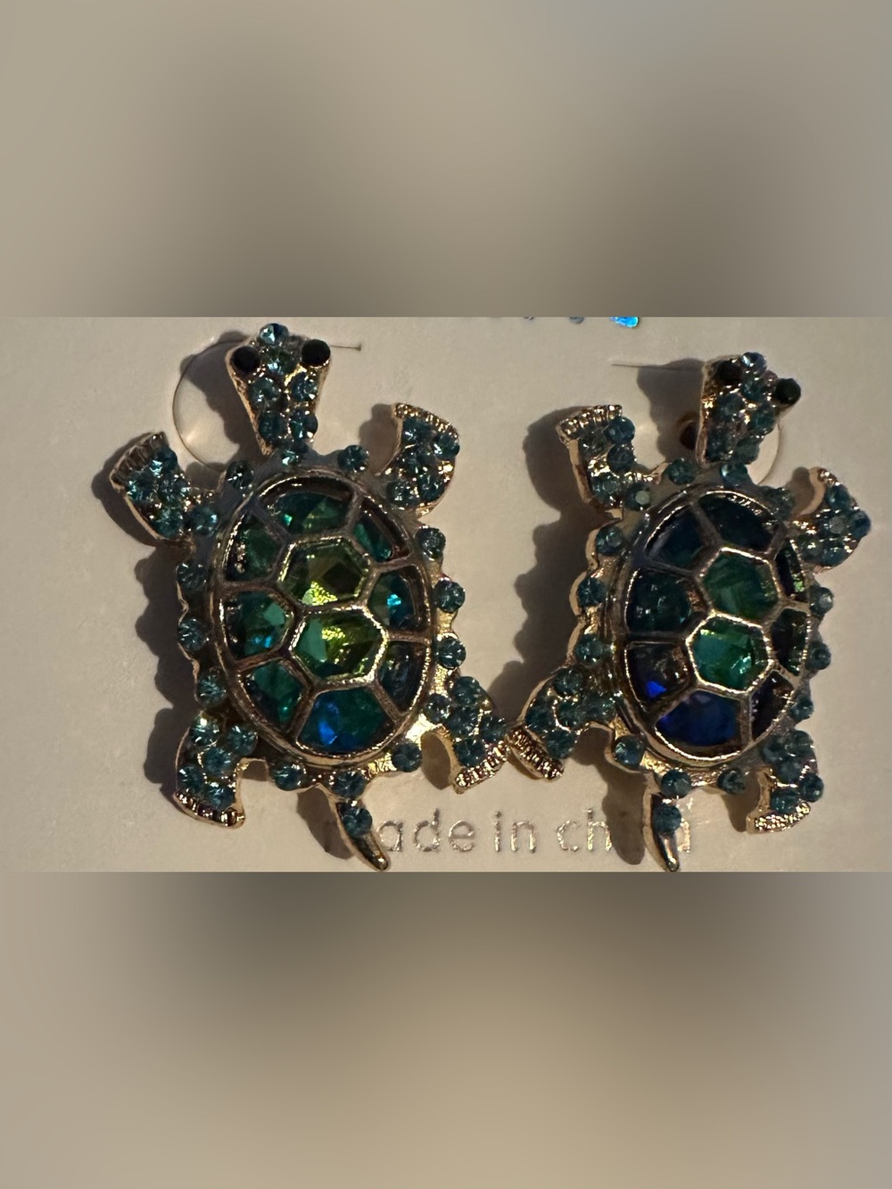 Gold-Tone Turtle Earrings with Blue Crystals